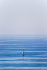 Sailing boat isolated. water textures and minimalistic view.