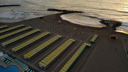 Empty closed yellow beach resort front to atlantic ocean