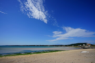 a beautiful seaside landscape against charming clouds
