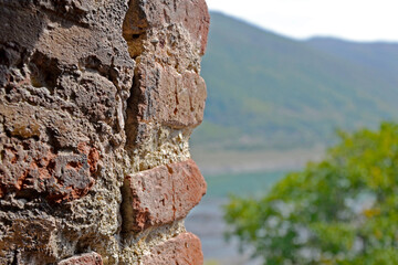 brick wall of a fortress in the mountains of Georgia