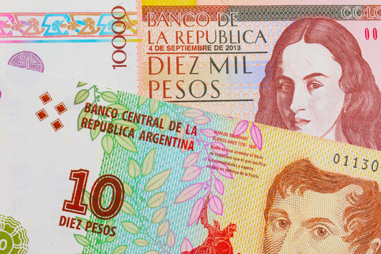 A macro image of a brown ten thousand bank note from Colombia paired up with a colorful ten peso note from Argentina.  Shot close up in macro.