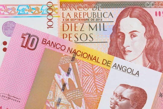 A macro image of a brown ten thousand bank note from Colombia paired up with a colorful ten kwanza bank note from Angola.  Shot close up in macro.
