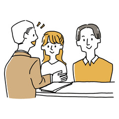 Fototapeta premium スーツの男性の説明を聞いている若い夫婦
