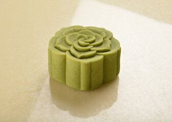 matcha green tea healthy no oil baked lotus paste mooncake with egg yolk and bean in green rose flower shape lantern mid autumn festival halal product menu