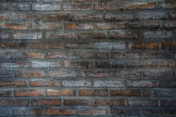 Grungy bricks wall indoor.