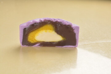 traditional healthy no oil baked yam taro lotus paste mooncake with sweet bean and mochi in purple...