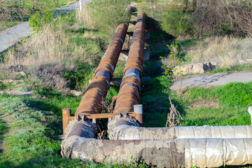 Two heating pipes are laid next to the ground.