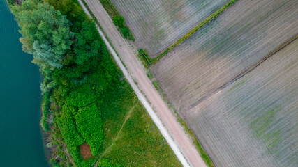 Beautiful natural Patterns of Farmfields in Countryside at Summer. Drone Aerial View, birds eye view. High quality photo