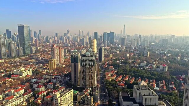 Aerial view of cityscape of Shanghai, China. Shikumen and skyscrapers in winter 