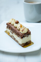 chocolate cake with nuts and coffee