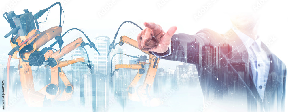 Poster mechanized industry robot arm and factory worker double exposure . concept of robotics technology fo