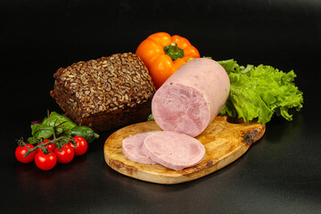 Pork ham sausage cut isolated