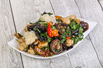 Pickled asian mushroom mux with herbs