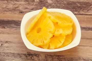 Marinated pineapple rings in the bowl