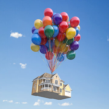 House with balloons bunch flying in the sky. Real estate purchasing, moving house and housewarming concept.