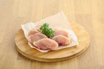 Raw chicken breast slices for cooking