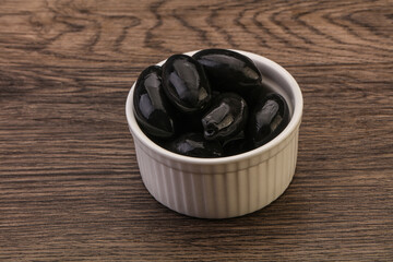Pickled black olives in the bowl