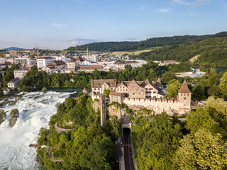 Fototapeta na wymiar Aerial image with drone over the Rhine Falls and Castle Laufen in Switzerland - the largest waterfall in Europe