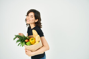 woman with a package of groceries health care delivery supermarket