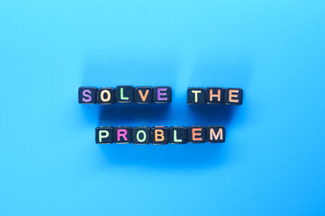 black cubes with the words Solve the problem colored