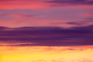 Colorful sunset with clouds in the sky.