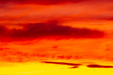 Colorful sunset with clouds in the sky.