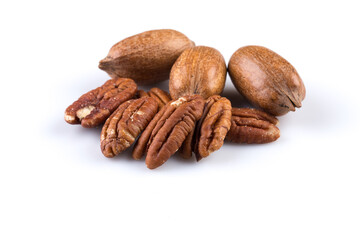 Few pecan nuts isolated on white