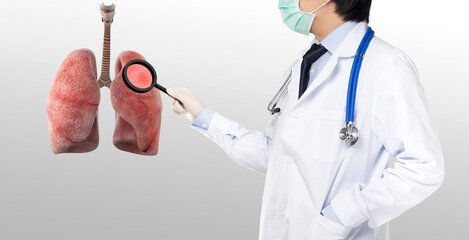doctor examines lung cells