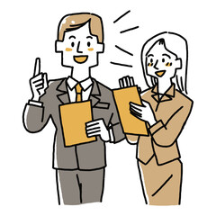 意見を交換するスーツの男性と女性