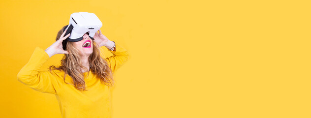 amazed woman watching with virtual reality glasses