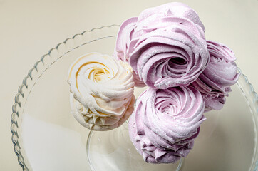 The marshmallow is curly in a glass vase. High quality photo