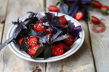 Summer fitness salad with strawberries and basil. Healthy food.