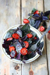 Summer fitness salad with strawberries and basil. Healthy food.