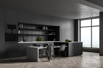 Corner of panoramic kitchen room with square niche in cabinet, dark grey