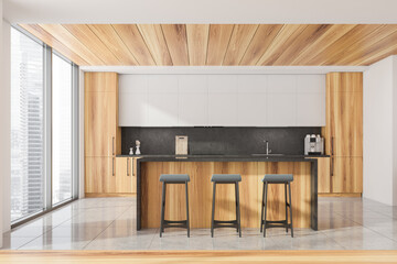 Front view of white, black panoramic kitchen with bar stools, wooden coatings