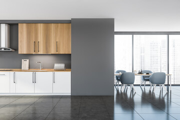 Kitchen, panoramic dining room with blue chairs