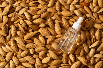 Essential almond oil bottles nuts almonds with shell