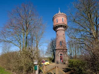 Fotobehang De oude watertoren in Zaltbommel is ontworpen door Jan Schotel en is gebouwd in 1905. © Holland-PhotostockNL
