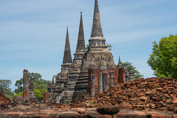 Obraz premium view to Wat Phra Si Sanphet temple in Ayutthaya historical park and temple bricks wall ruins remains, Ayutthaya, Thailand that the destination attractive tourists both Thai and foreigners