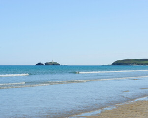 Hayle beach sea and Godrevy Lighthouse Cornwall