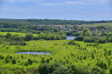 Fototapeta na wymiar View of the village Zaozerye from the top of Mount Sorokinskaya
