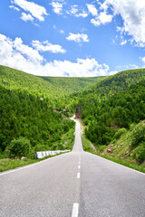 the road between the mountains . Caucasus. snowy peaks