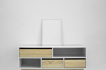 minimalist frame mockup on the desk drawer with white background. minimalism theme decoration for interior design ideas.