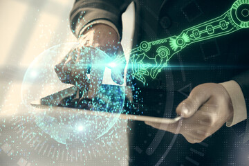 Double exposure of man's hand holding and using a digital device and data theme hologram drawing. Technology concept.