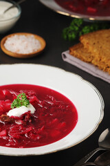 A plate with Ukrainian national dish - borsch