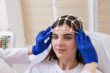 Patient brain testing using encephalography at medical center