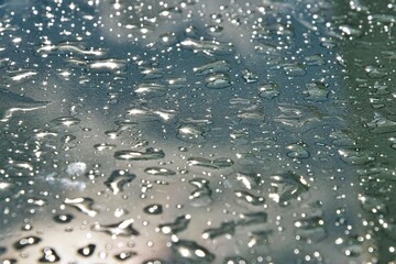 Naklejka na ściany i meble raindrops on glass surface