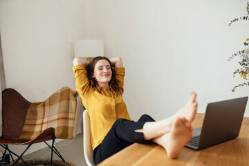 Blissful young woman taking a quiet moment to relax