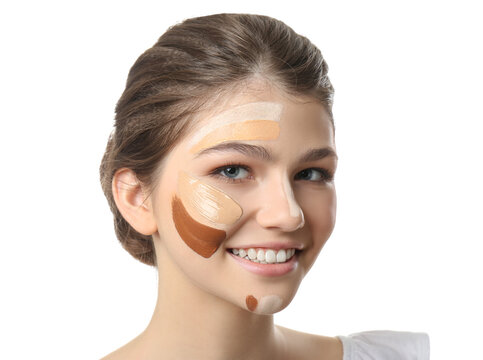 Beautiful girl on white background. Using concealer and foundation for face contouring