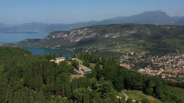 Aerial panorama Monastery on the hill. Monastery on the Eremo di San Giorgio hill, Lake Garda, Italy. Aerial view of Eremo di San Giorgio, Bardolino. Home of Italian monks, lake garda.